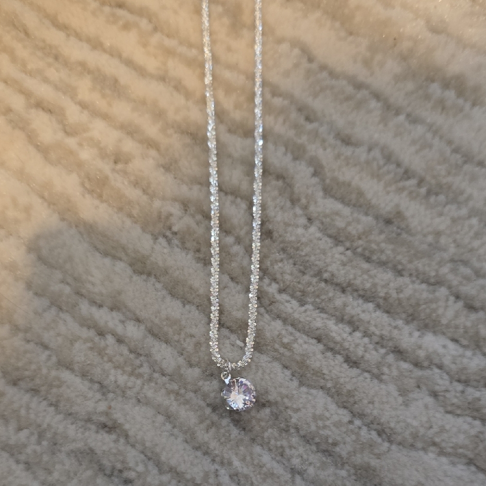 Elegant Silver Necklace with Clear Pendant